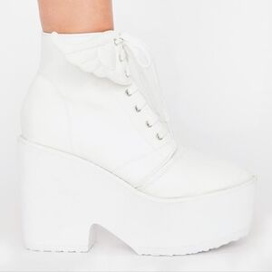 White angel winged platform boots